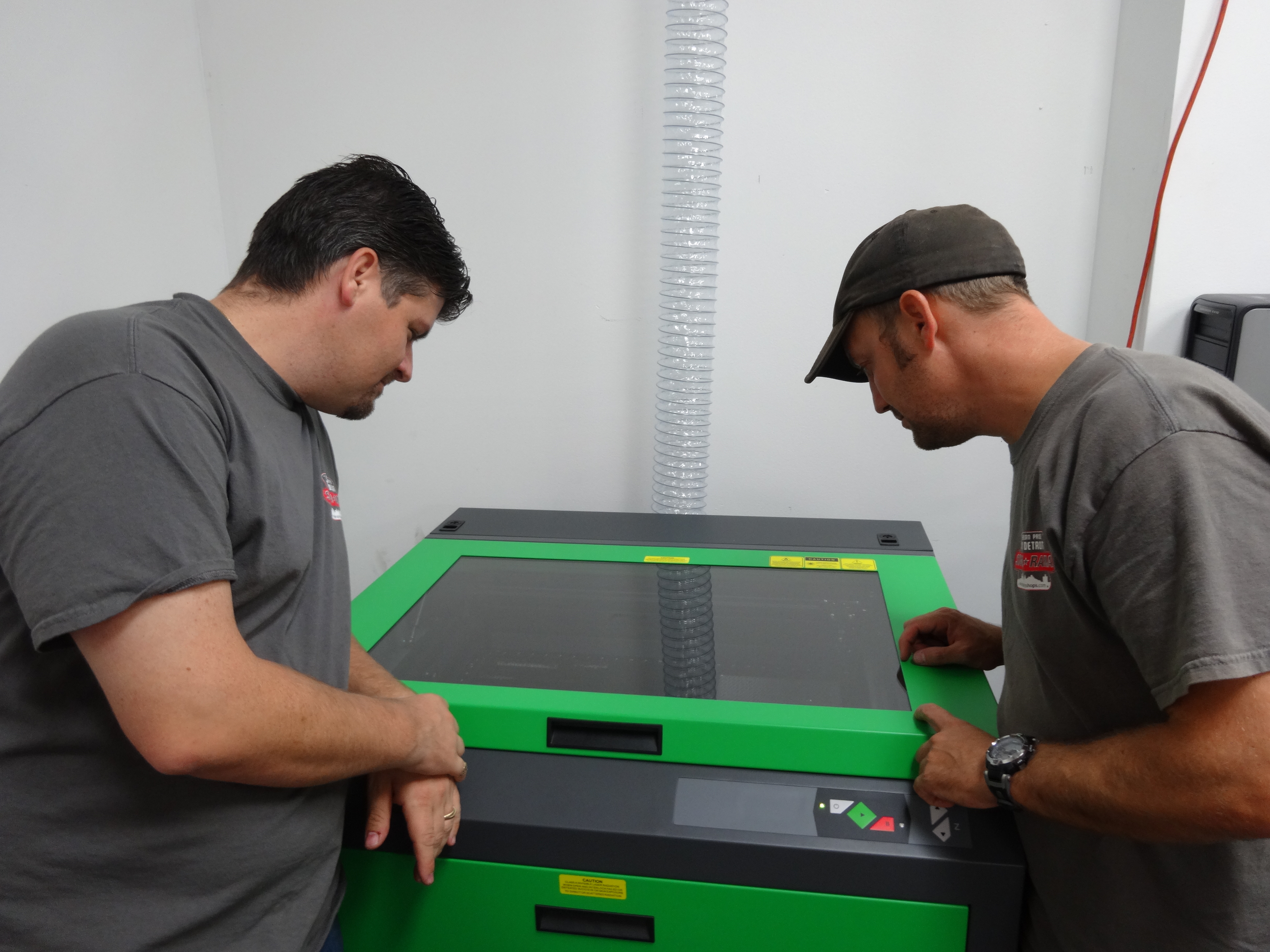 Signarama Troy expands product line with the purchase of a Laser Engraver!