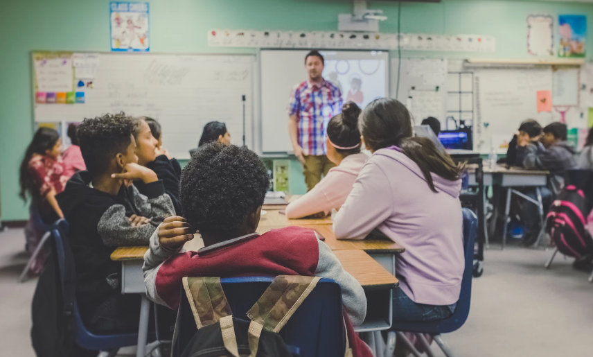 Teacher and students in a classroom