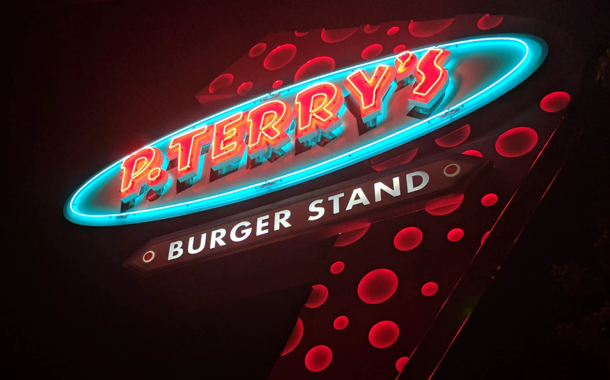 Neon burger ad sign