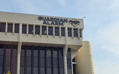 Exterior of an office building with a sign that says Guardian Alarm