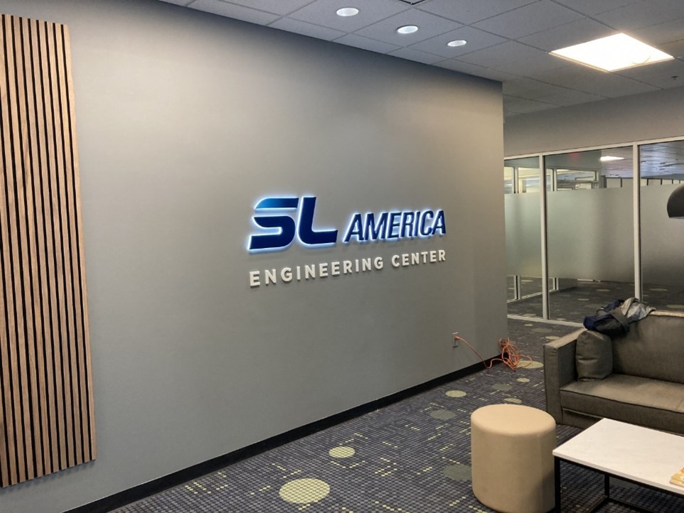 SL America lobby sign in Auburn Hills, MI